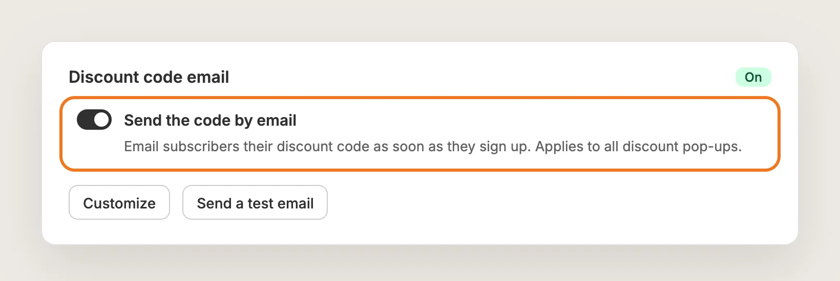 Discount code email card with Send the code by email switched on and highlighted, plus Customize and Send a test email buttons