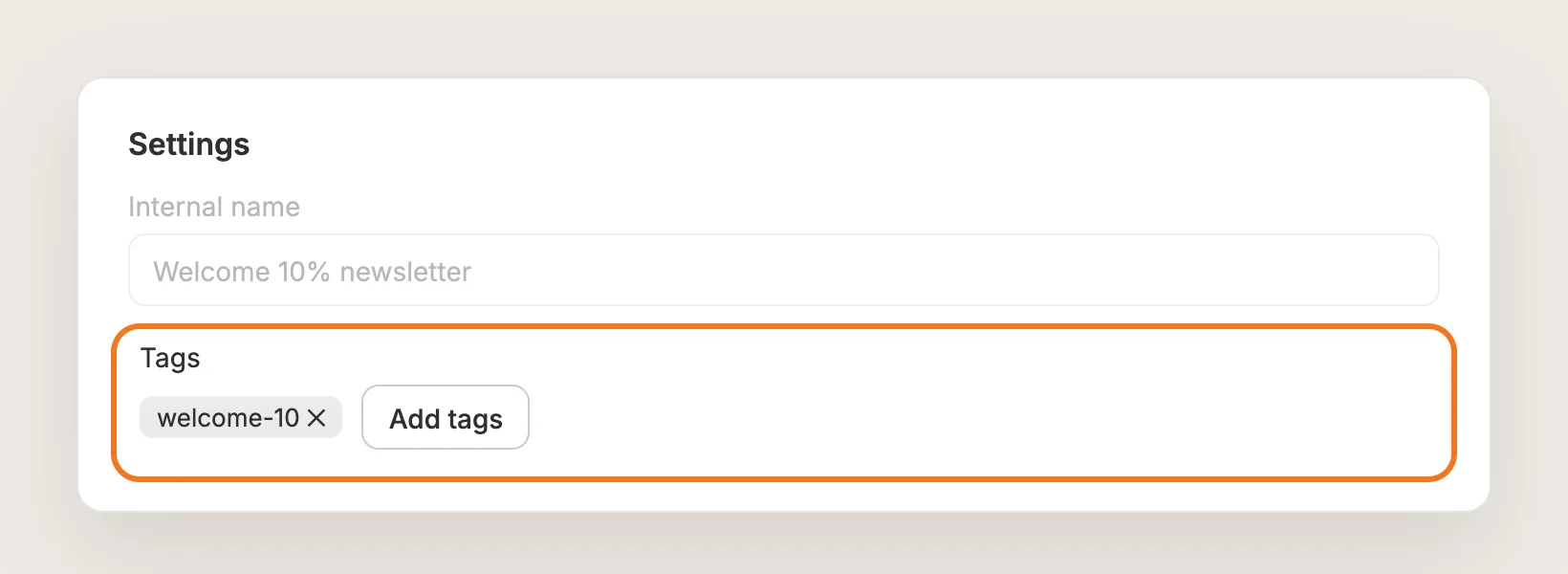 Settings card with the Tags section highlighted and a welcome-10 tag added