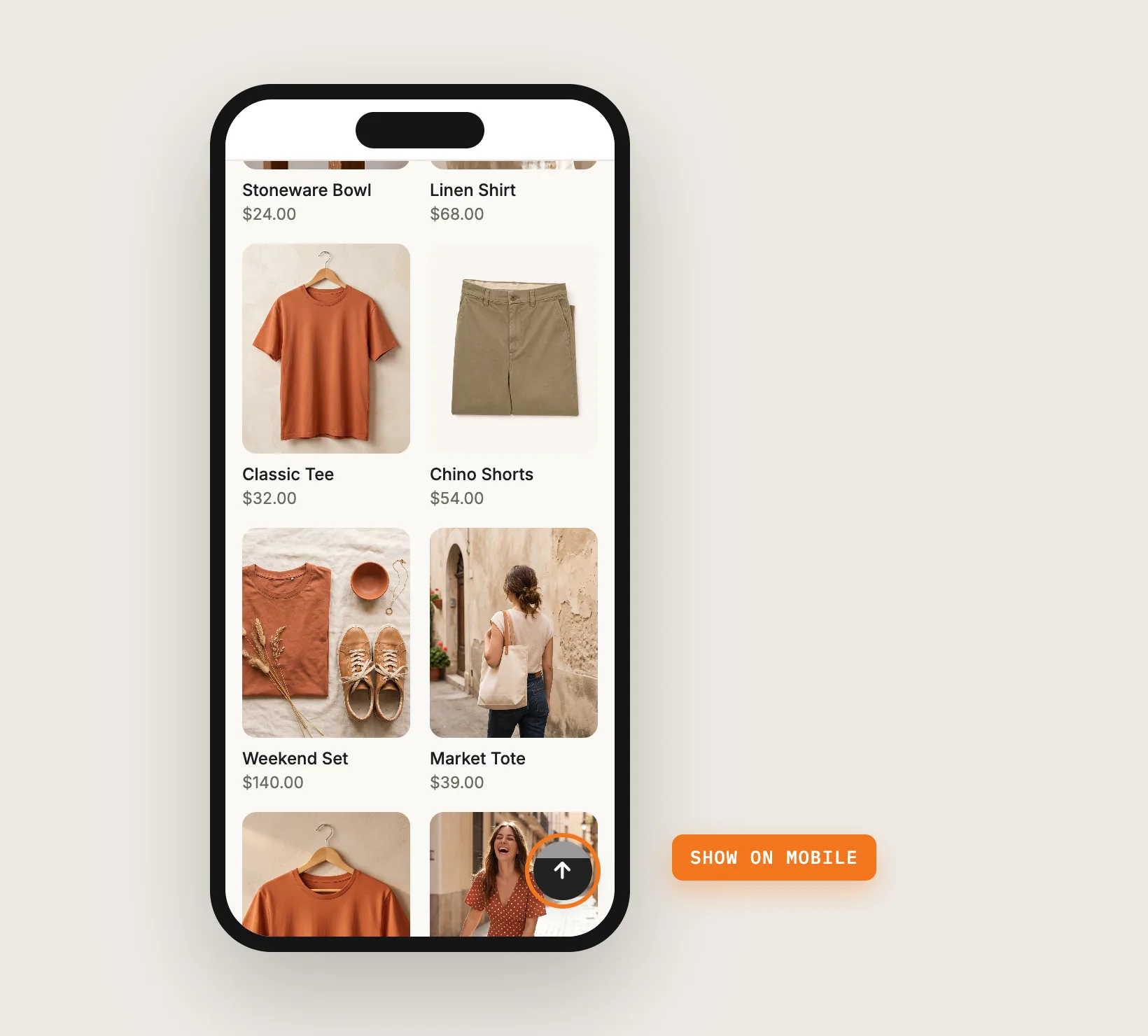 A phone showing a long collection page with the scroll to top button in the bottom right corner